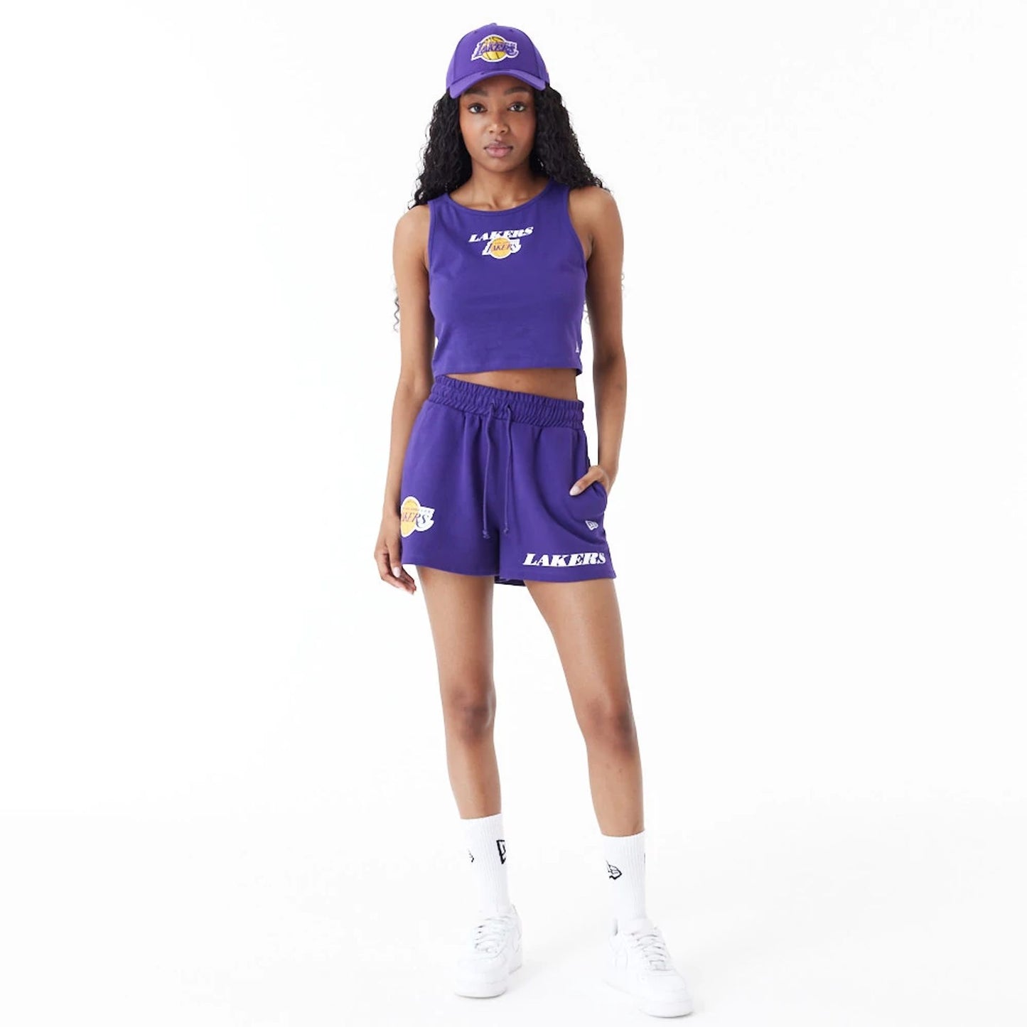 The Female model is wearing LA Lakers Women's NBA Team Logo Purple Crop Tank Top 7