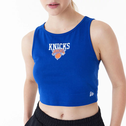 The Female model is wearing New York Knicks Womens NBA Team Logo Blue Crop Tank Top 4