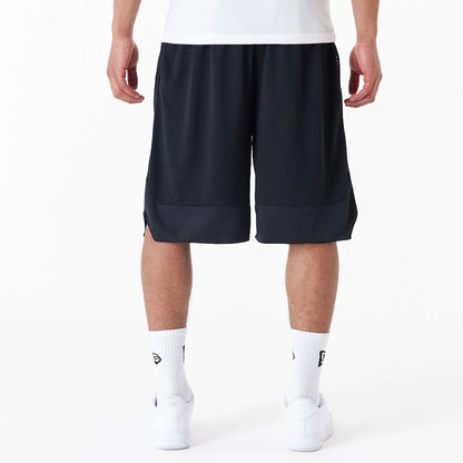 The Male model is wearing New Era Black Oversized Mesh Shorts 7