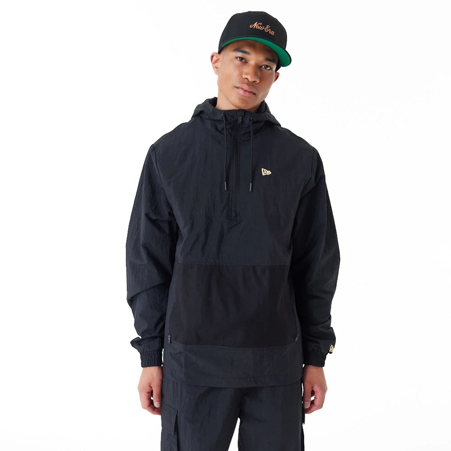 The Male model is wearing New Era Windbreaker Black Windbreaker 1