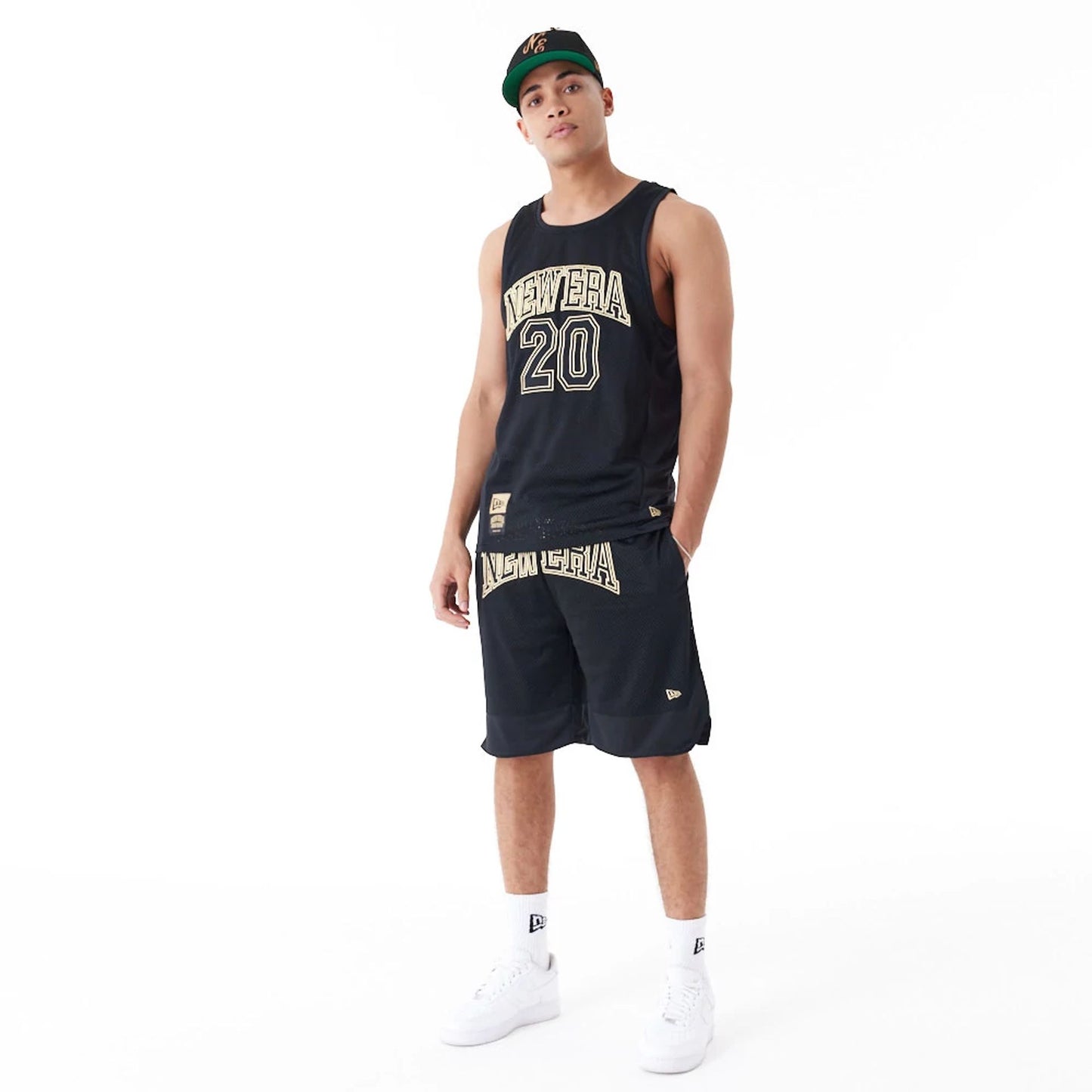 The Male model is wearing New Era Mesh Black Tank Top 2