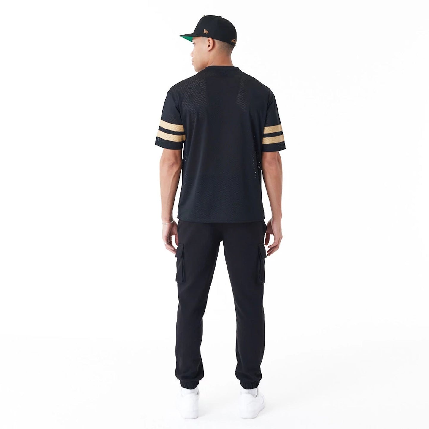 The Male model is wearing New Era Mesh Black Oversized T-Shirt 3