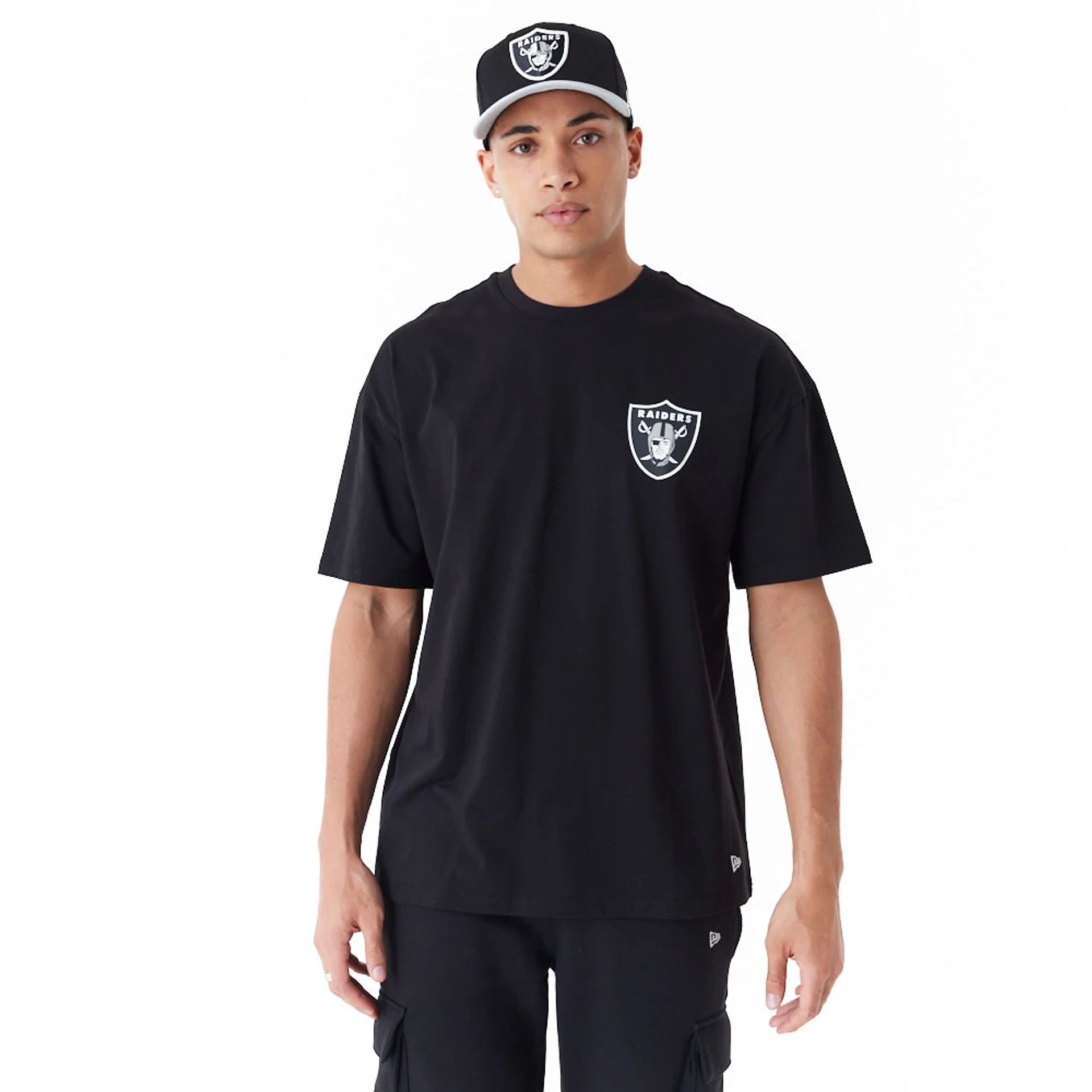 The Male model is wearing Las Vegas Raiders NFL Drop Shoulder Black Oversized T-Shirt 1