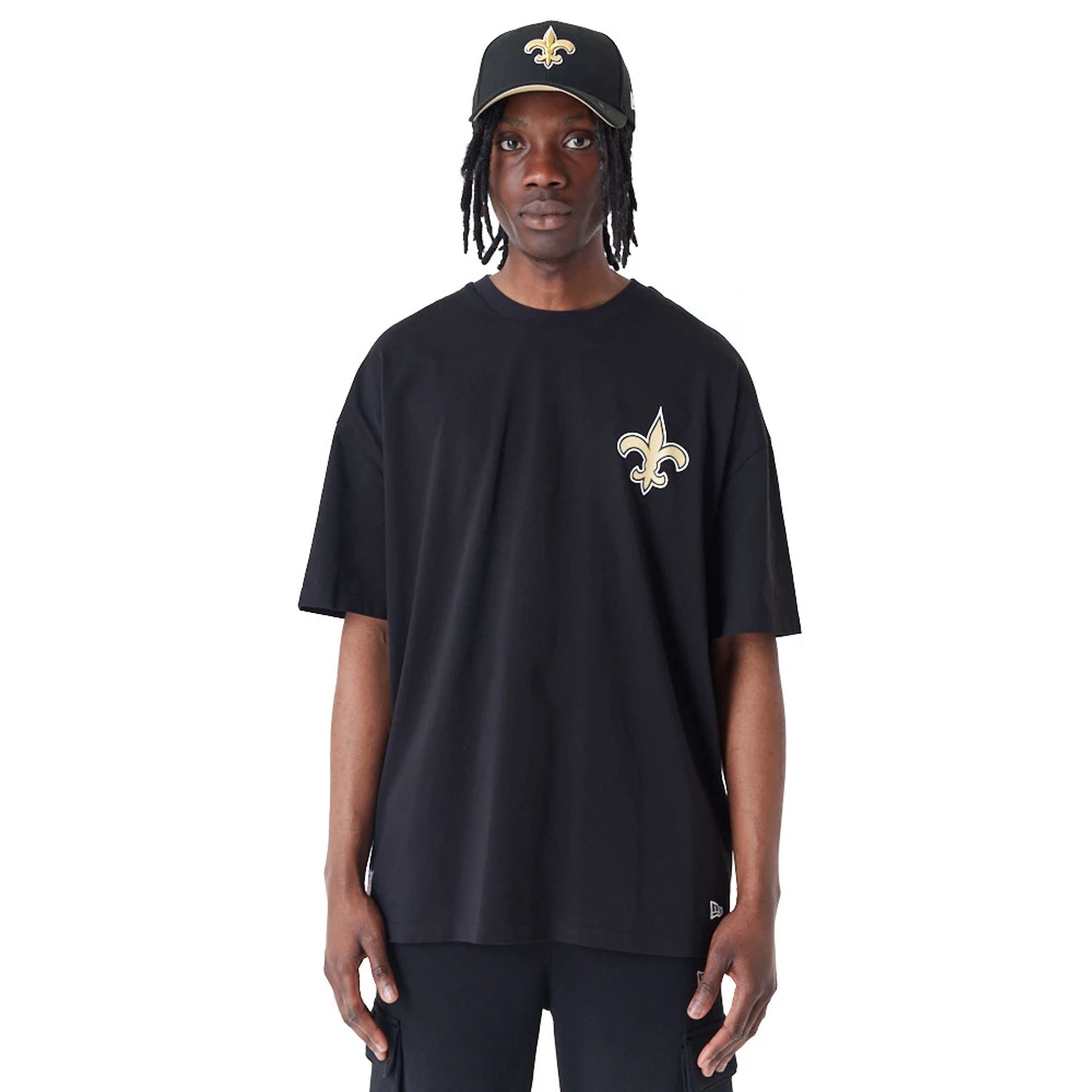 The Male model is wearing New Orleans Saints NFL Drop Shoulder Black Oversized T-Shirt 1