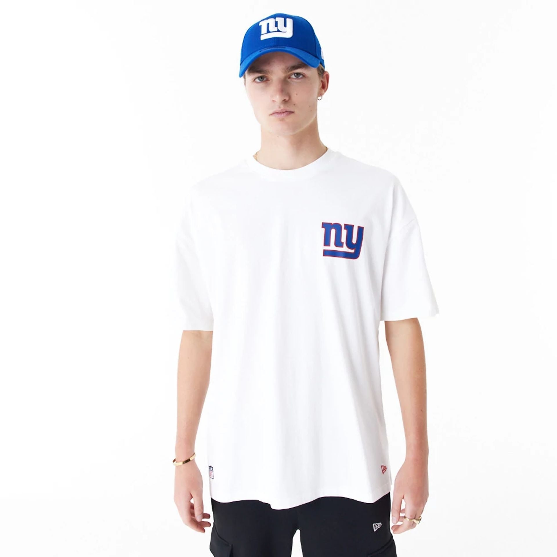 The Male model is wearing New York Giants NFL Drop Shoulder White Oversized T-Shirt 1