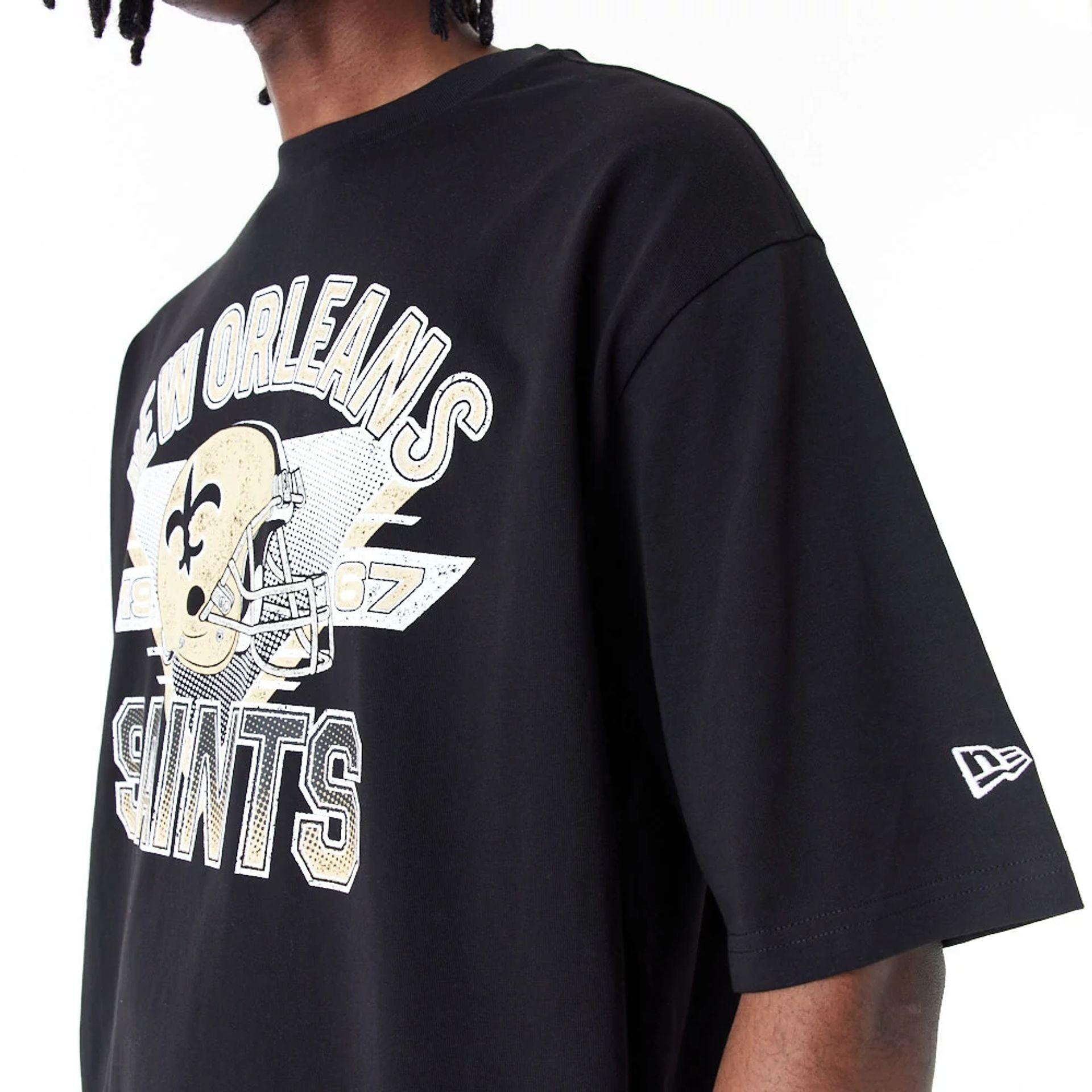 The Male model is wearing New Orleans Saints NFL Black Oversized T-Shirt 5