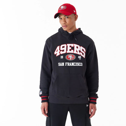 The Male model is wearing San Francisco 49Ers NFL Black Oversized Pullover Hoodie 7