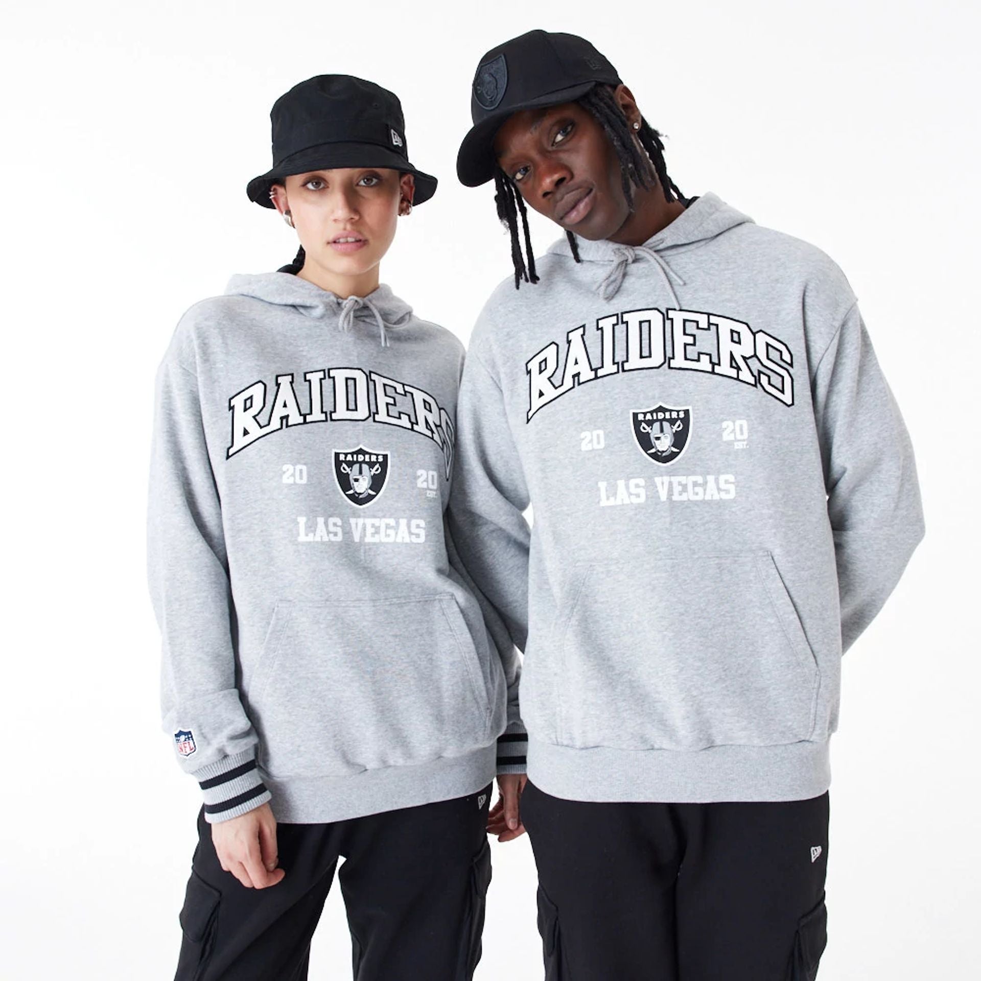 The Male model is wearing Las Vegas Raiders NFL Grey Oversized Pullover Hoodie 1