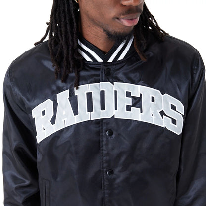 The Male model is wearing Las Vegas Raiders NFL Shiny Satin Black Bomber Jacket 7