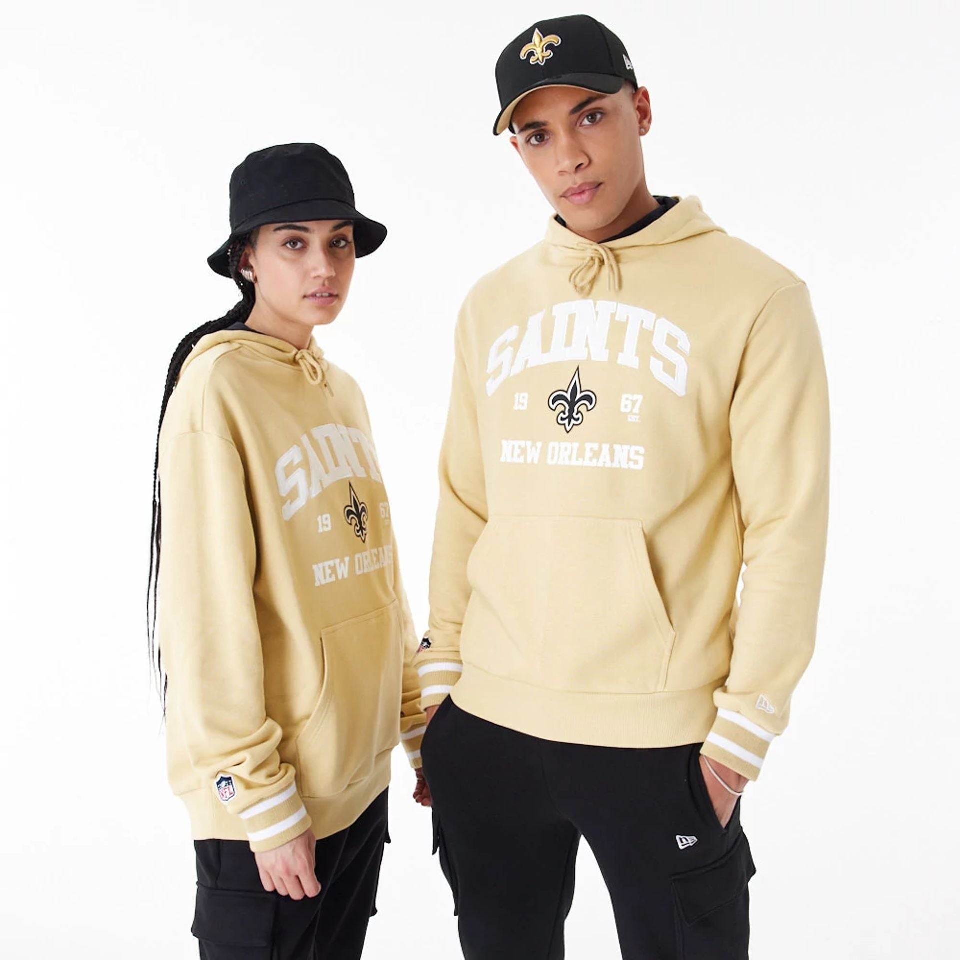 The Male model is wearing New Orleans Saints NFL Stone Oversized Pullover Hoodie 7