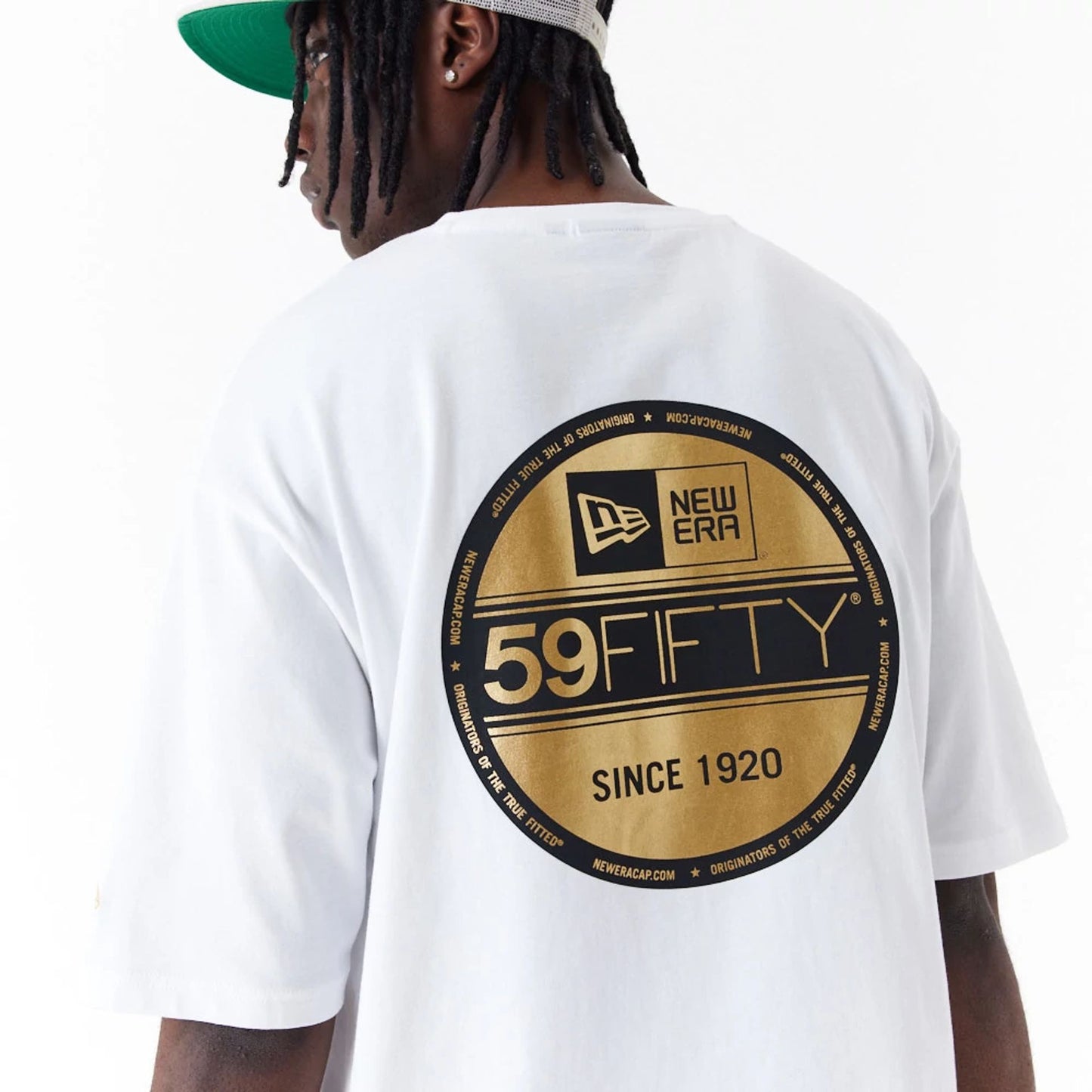 The Male model is wearing New Era Sticker White Oversized T-Shirt 5