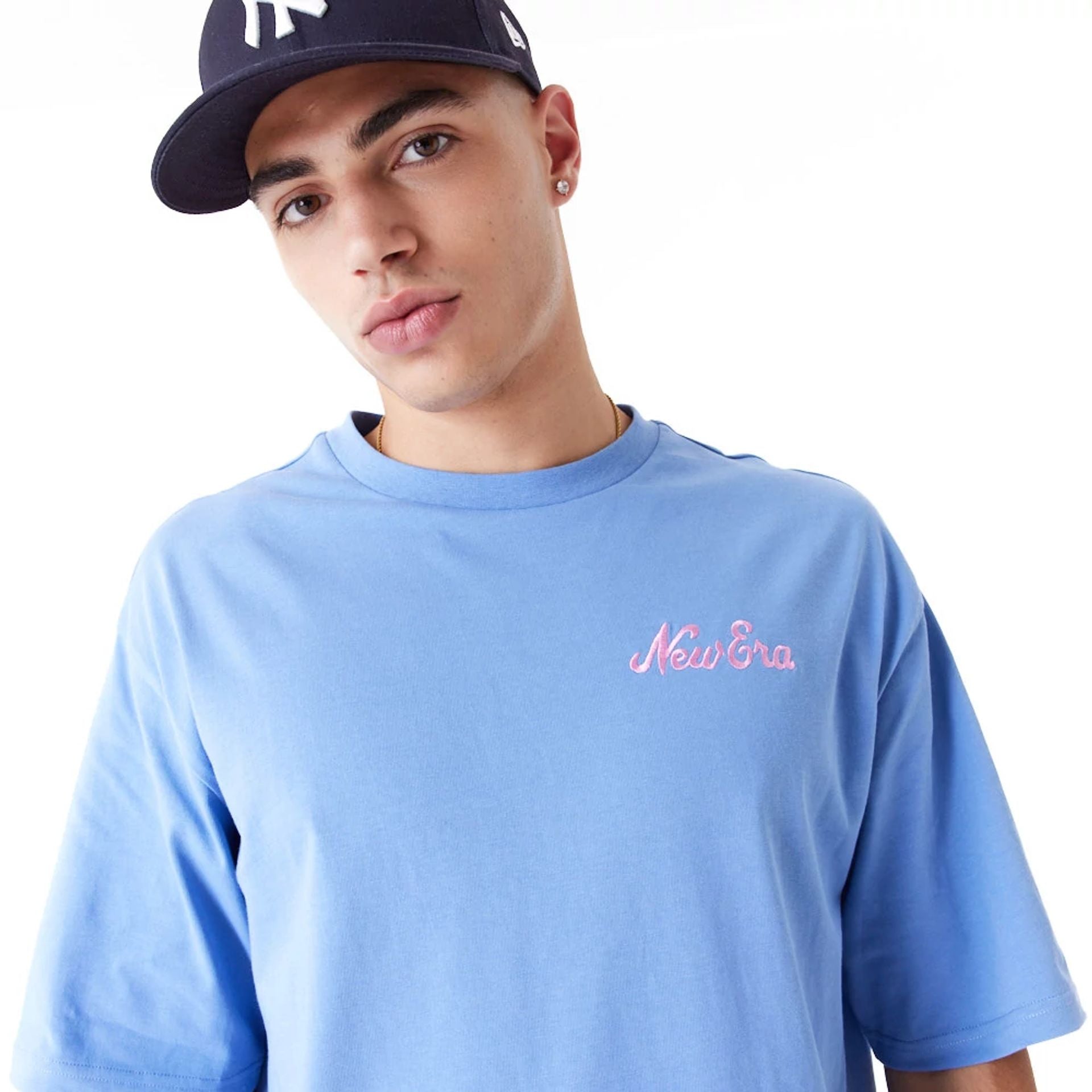 The Male model is wearing New Era Food Graphic Blue Oversized T-Shirt 5