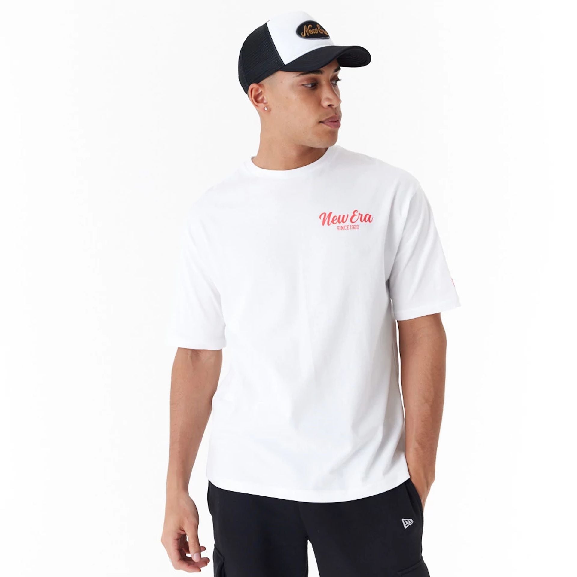 The Male model is wearing New Era Cactus Graphic White Oversized T-Shirt 2