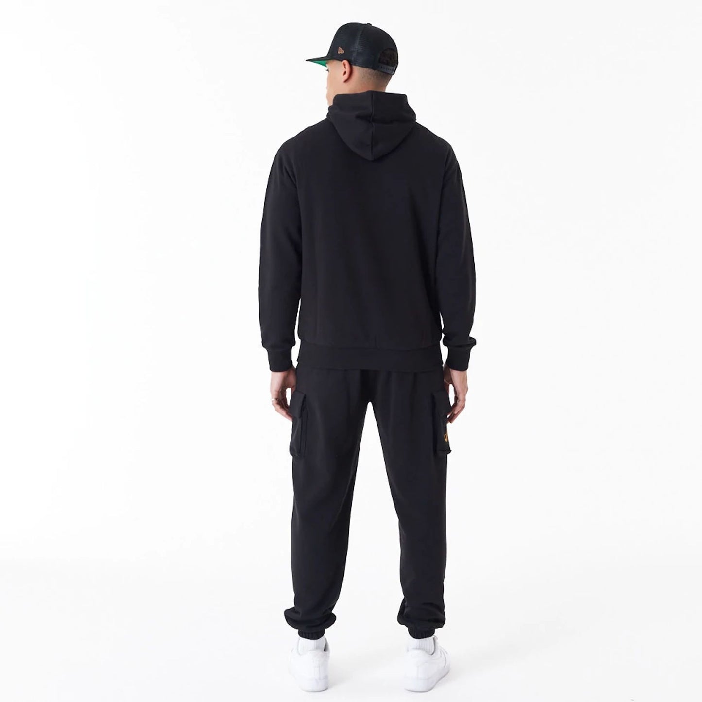 The Male model is wearing New Era Script Logo Black Oversized Pullover Hoodie 2