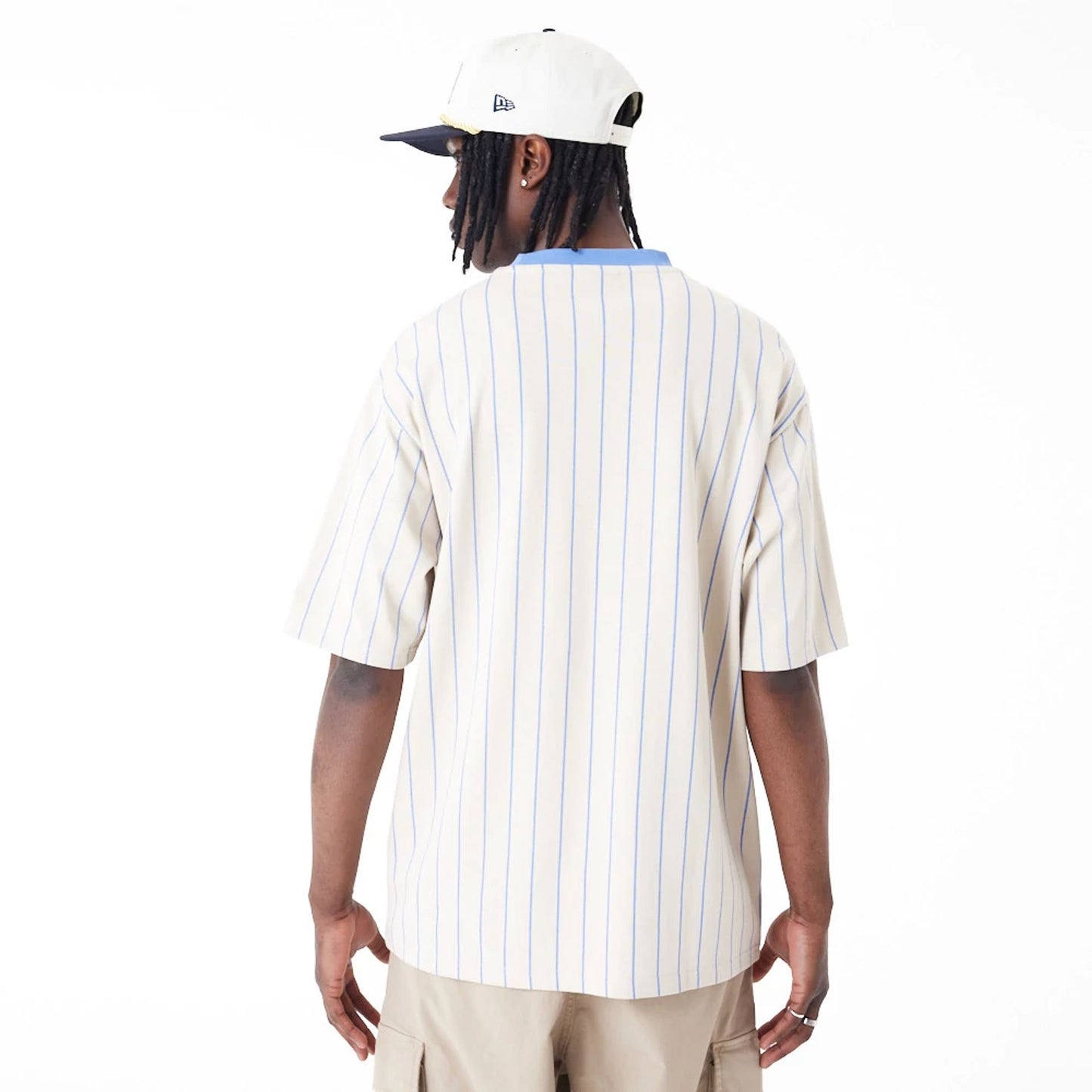 The Male model is wearing New Era Pinstripe Stone Oversized T-Shirt 6