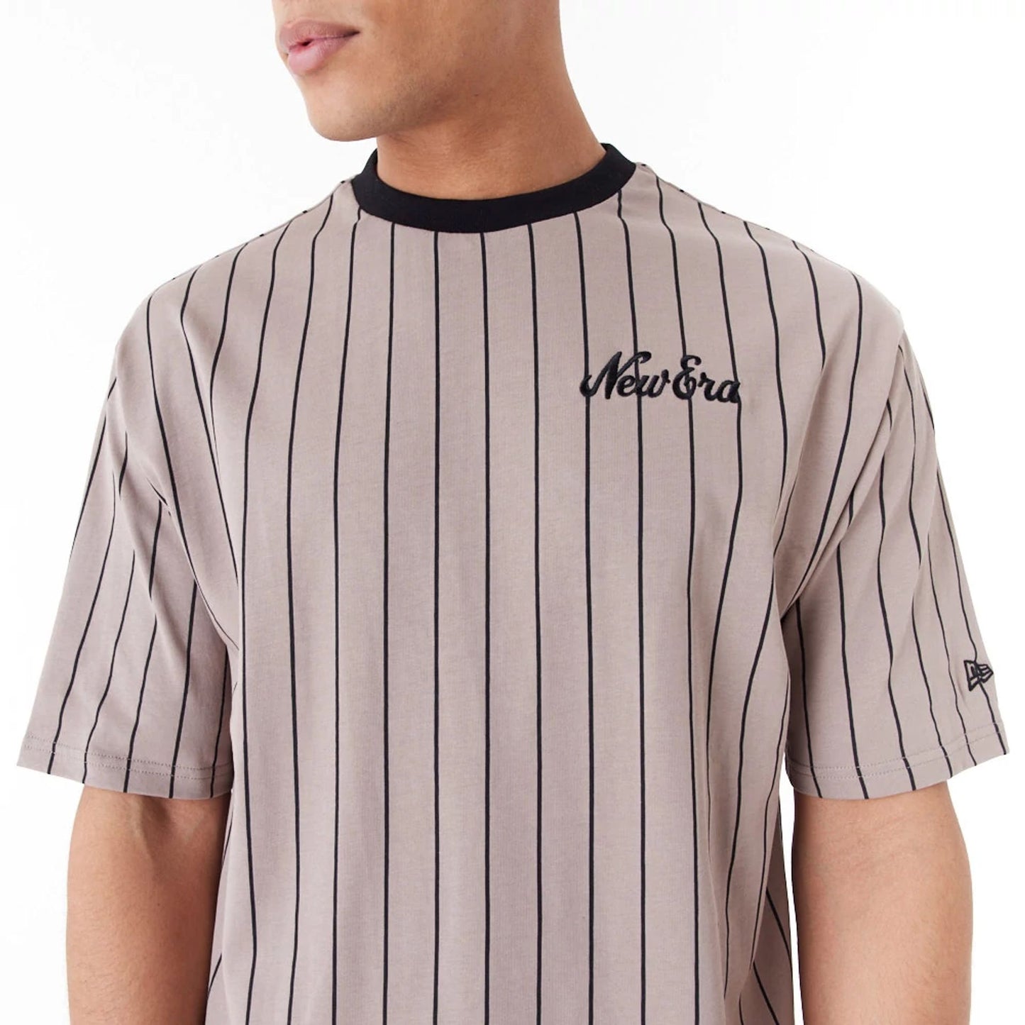 The Male model is wearing New Era Pinstripe Brown Oversized T-Shirt 6