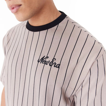 The Male model is wearing New Era Pinstripe Brown Oversized T-Shirt 3