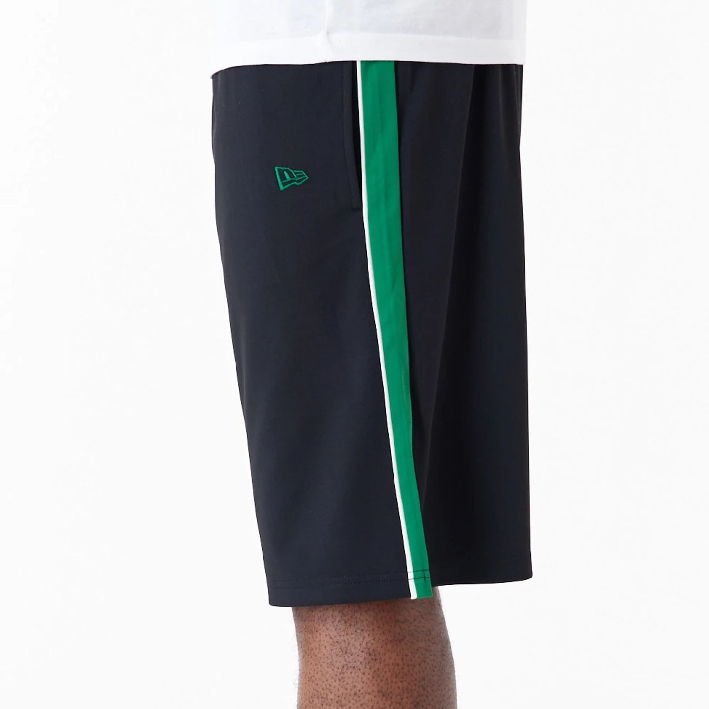 The Male model is wearing New Era Dark Green Panel Black Shorts 8