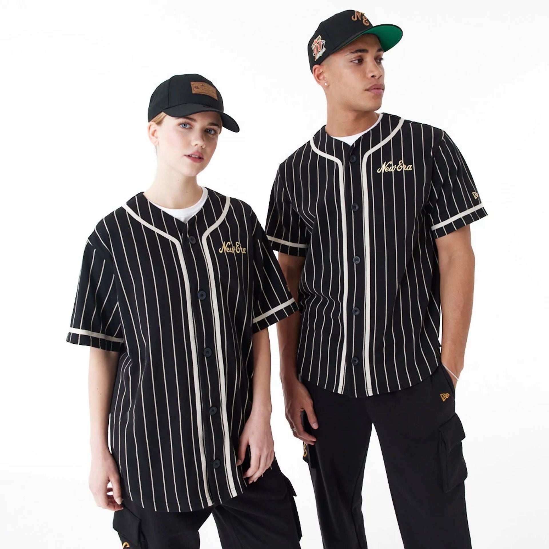 The Male model is wearing New Era Pinstripe Black Jersey 1