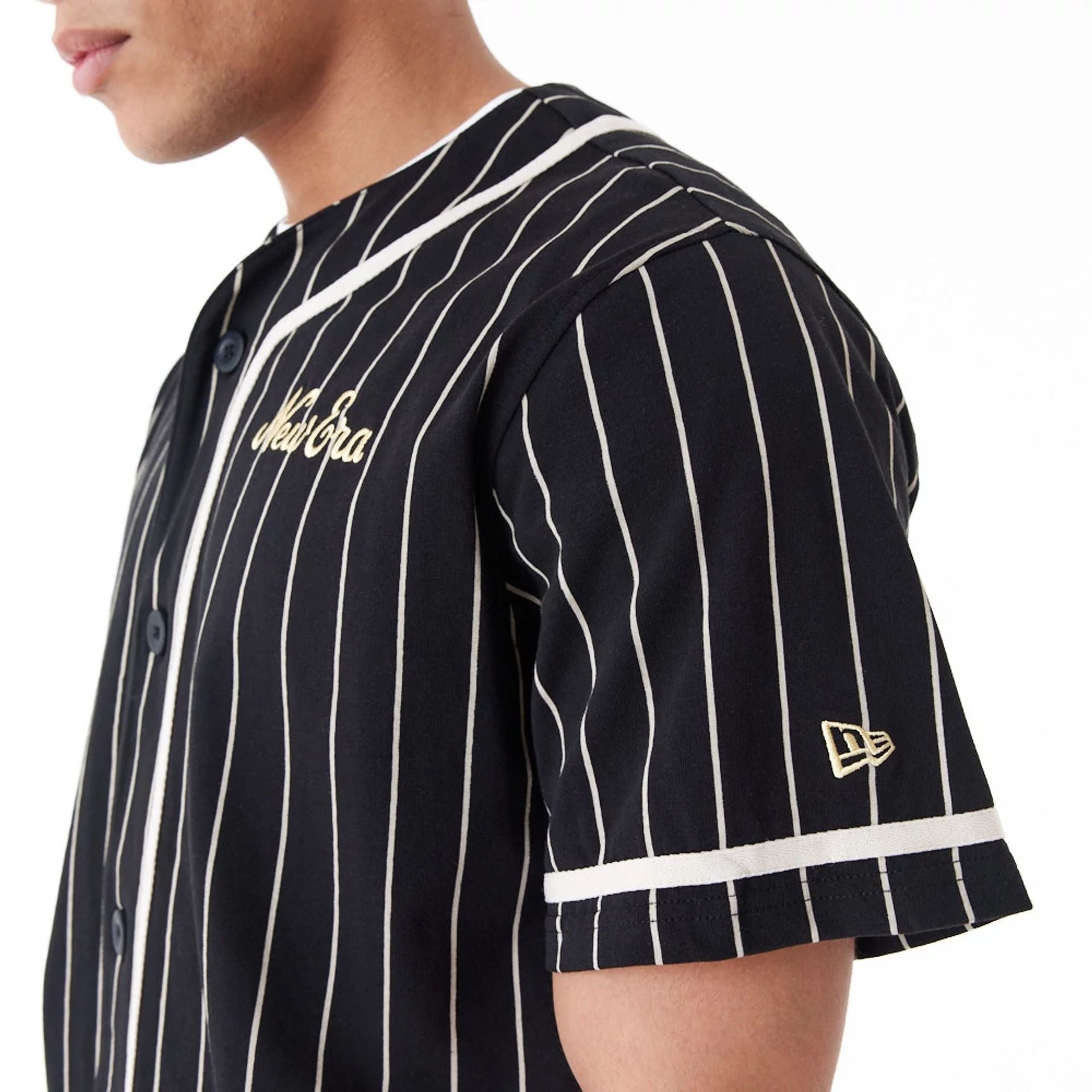 The Male model is wearing New Era Pinstripe Black Jersey 5