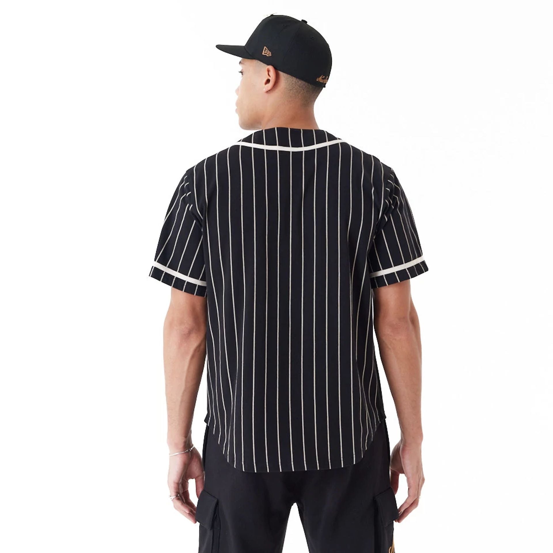 The Male model is wearing New Era Pinstripe Black Jersey 3