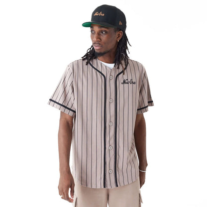 The Male model is wearing New Era Pinstripe Brown Jersey 8