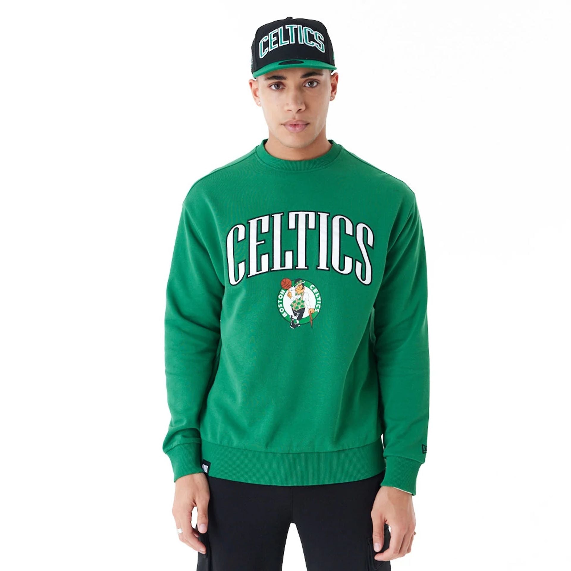 The Male model is wearing Boston Celtics NBA Arch Graphic Green Oversized Crew Neck Sweatshirt 2