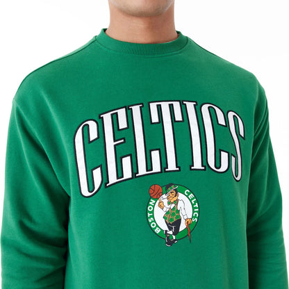 The Male model is wearing Boston Celtics NBA Arch Graphic Green Oversized Crew Neck Sweatshirt 6