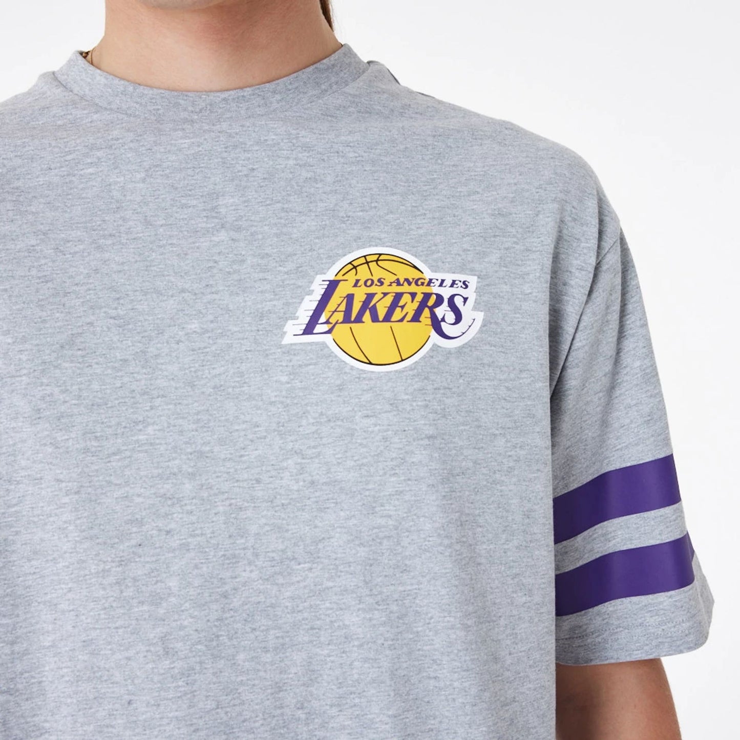 The Male model is wearing LA Lakers NBA Arch Graphic Grey Oversized T-Shirt 7