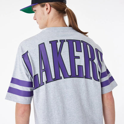 The Male model is wearing LA Lakers NBA Arch Graphic Grey Oversized T-Shirt 8