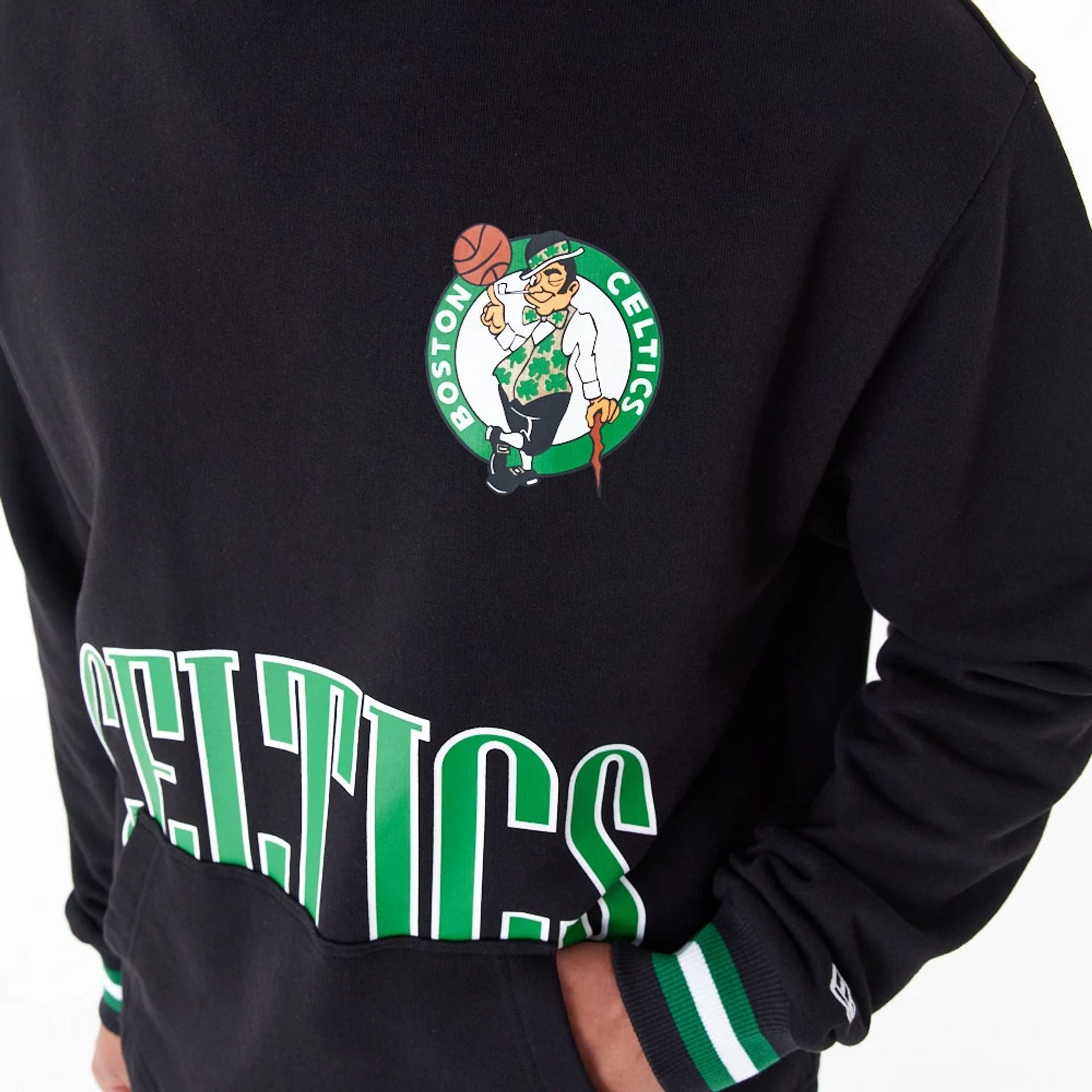 The Male model is wearing Boston Celtics NBA Arch Graphic Black Oversized Pullover Hoodie 2