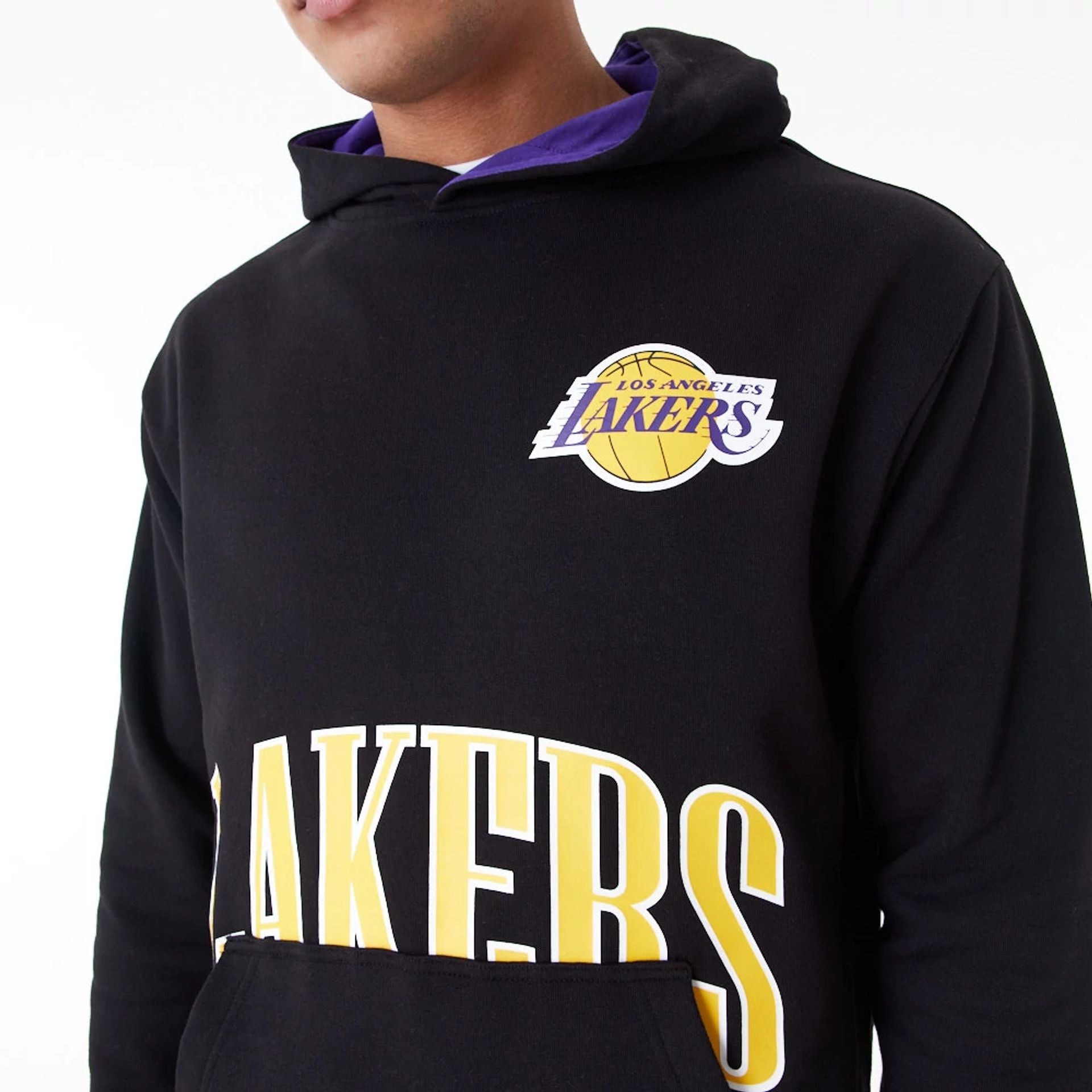 The Male model is wearing LA Lakers NBA Arch Graphic Black Oversized Pullover Hoodie 2