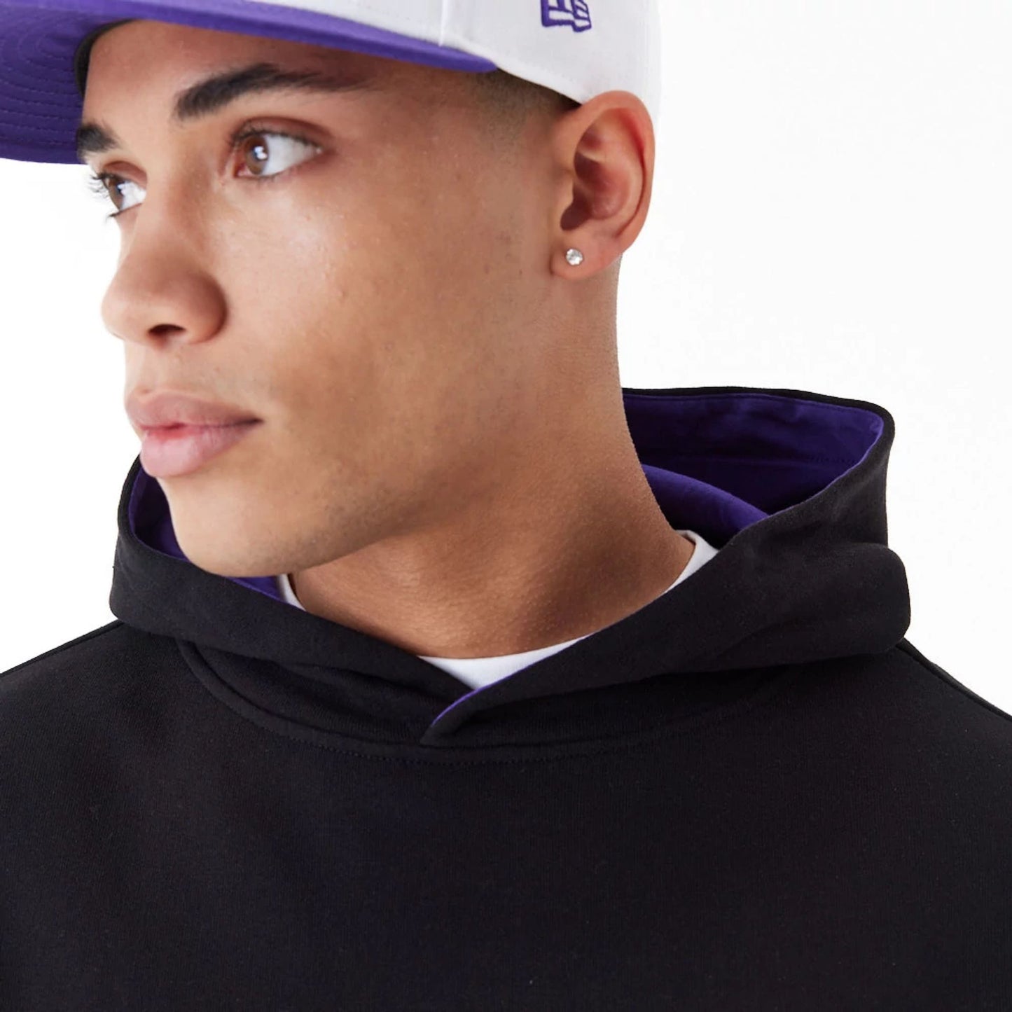 The Male model is wearing LA Lakers NBA Arch Graphic Black Oversized Pullover Hoodie 8