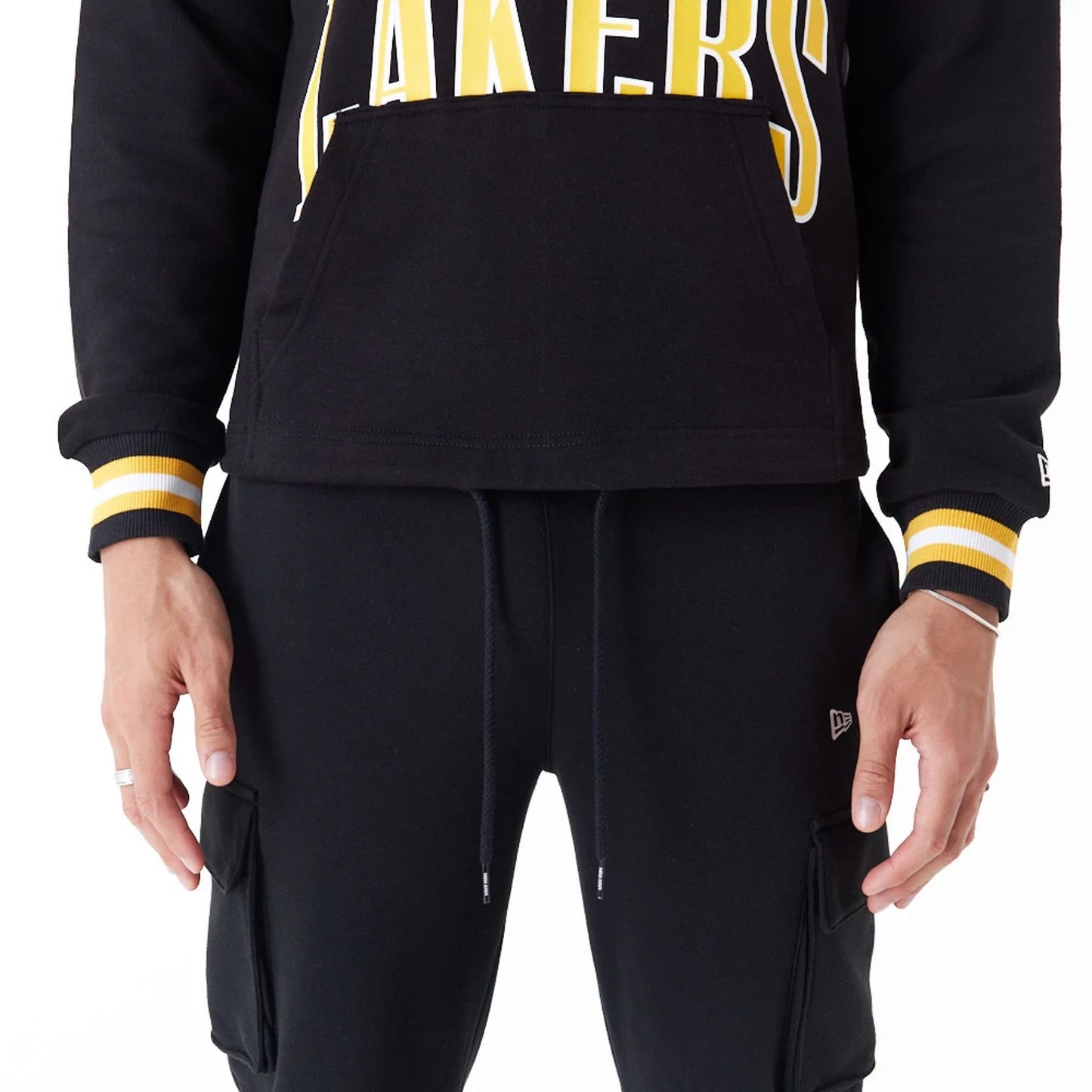 The Male model is wearing LA Lakers NBA Arch Graphic Black Oversized Pullover Hoodie 6