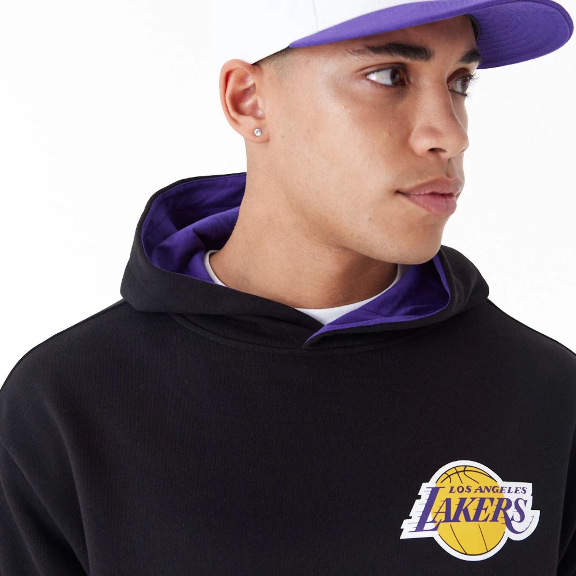 The Male model is wearing LA Lakers NBA Arch Graphic Black Oversized Pullover Hoodie 7