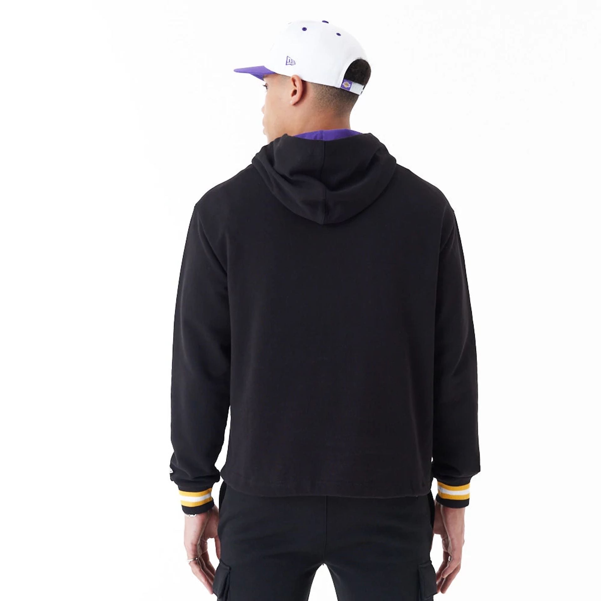 The Male model is wearing LA Lakers NBA Arch Graphic Black Oversized Pullover Hoodie 3