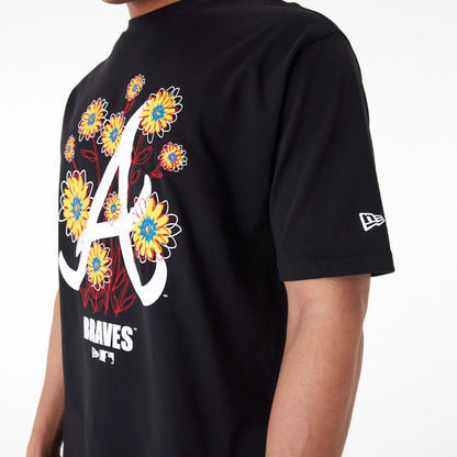 The Male model is wearing Atlanta Braves MLB Floral Logo Black Oversized T-Shirt 3