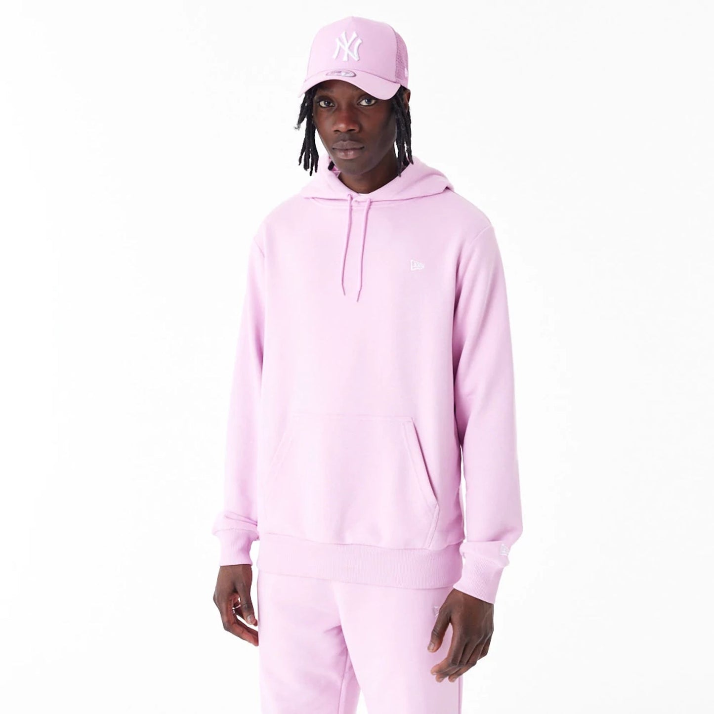 The Male model is wearing New Era Essential Pink Pullover Hoodie 11