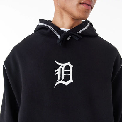 The Male model is wearing Detroit Tigers MLB World Series Black Oversized Pullover Hoodie 7