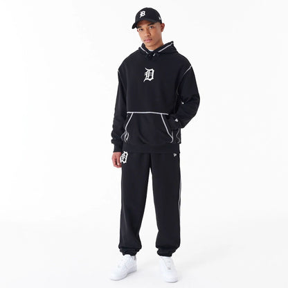 The Male model is wearing Detroit Tigers MLB World Series Black Oversized Pullover Hoodie 6