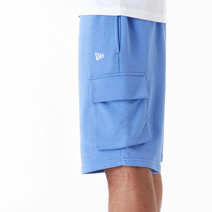 The Male model is wearing New Era Essential Blue Cargo Shorts 3