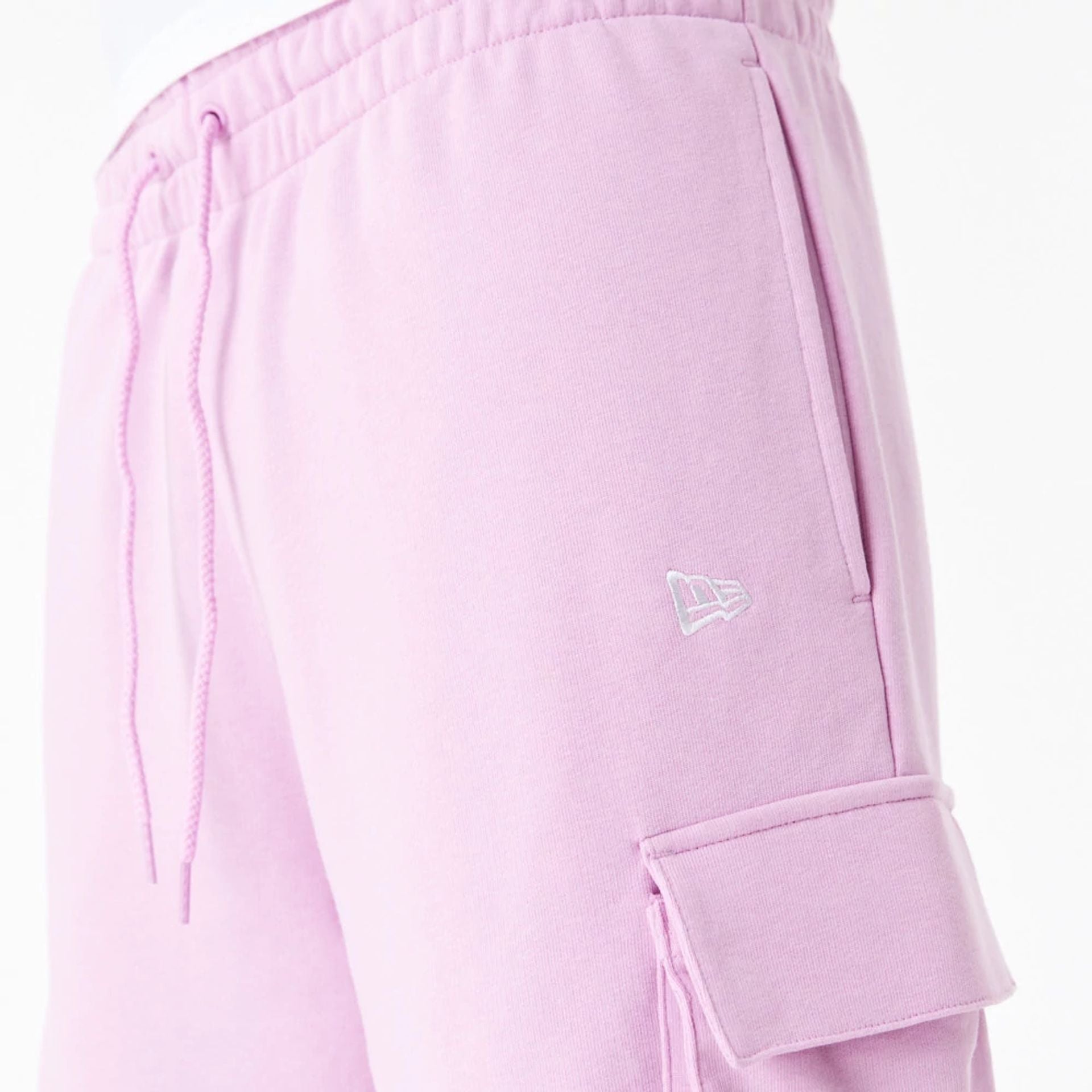 The Male model is wearing New Era Essential Pink Cargo Shorts 3