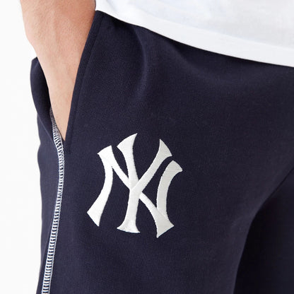 The Male model is wearing New York Yankees MLB Lifestyle Navy Joggers 4