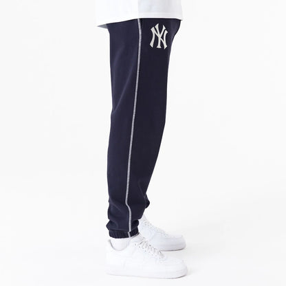 The Male model is wearing New York Yankees MLB Lifestyle Navy Joggers 5