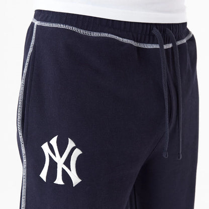 The Male model is wearing New York Yankees MLB Lifestyle Navy Joggers 8