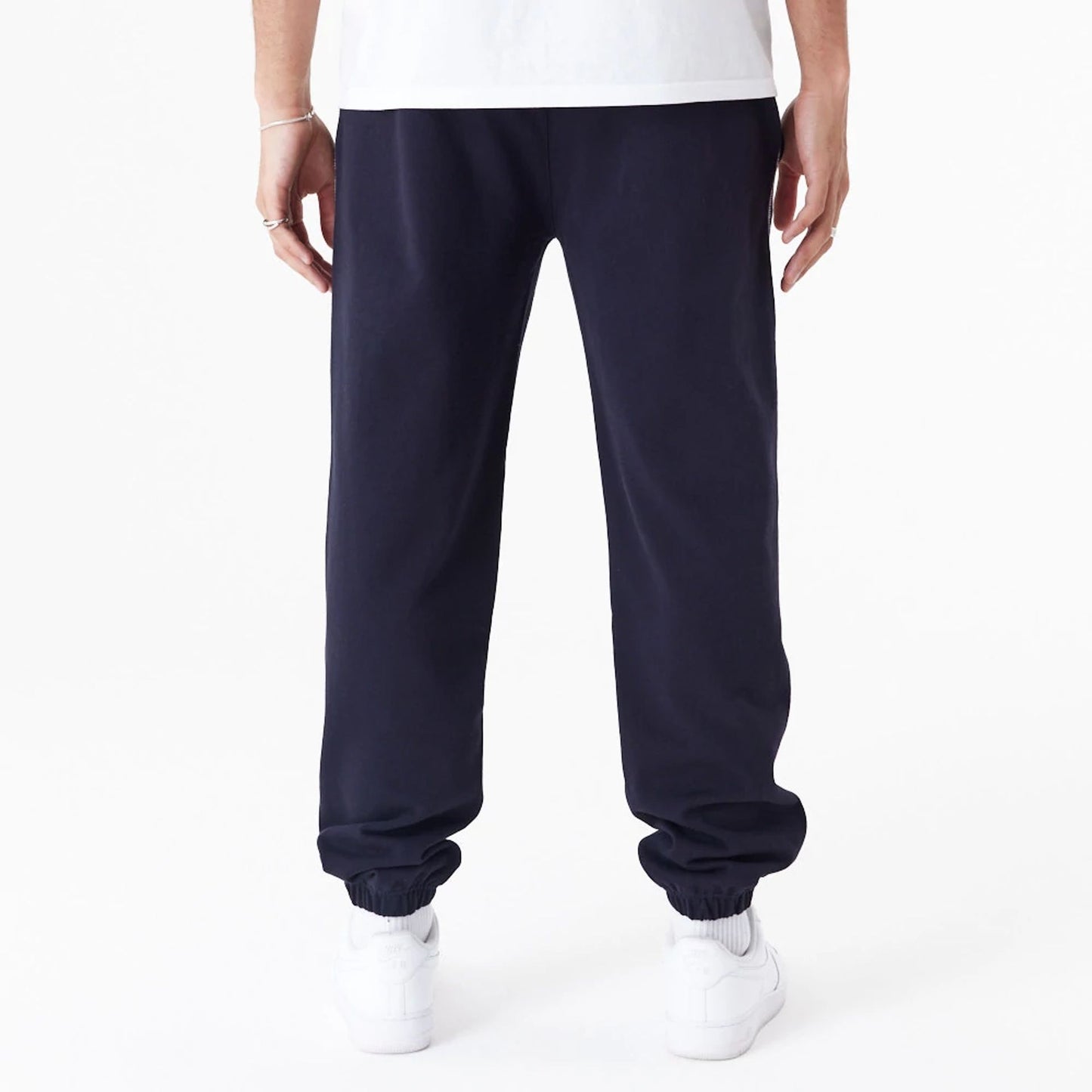 The Male model is wearing New York Yankees MLB Lifestyle Navy Joggers 10