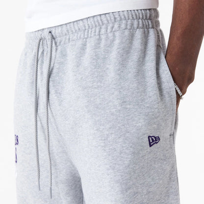 The Male model is wearing LA Lakers NBA Script Grey Relaxed Joggers 7