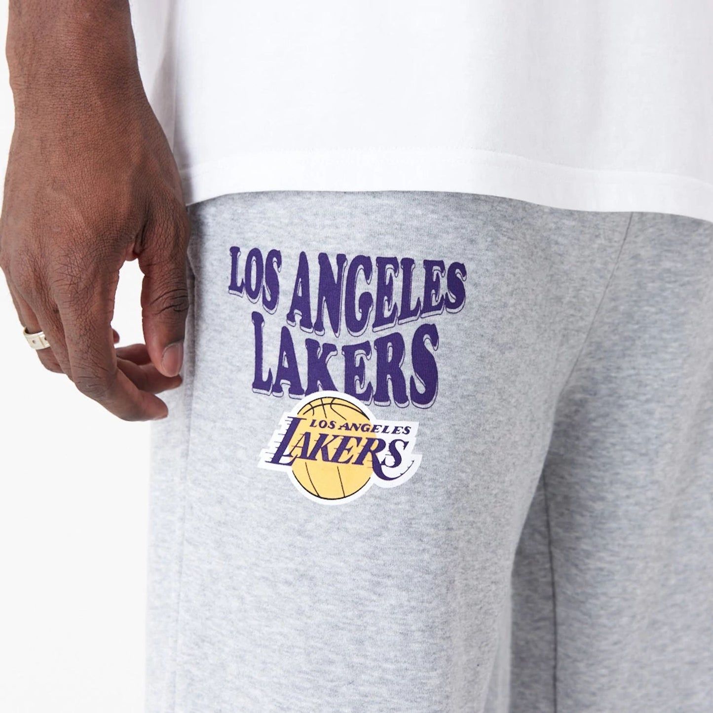 The Male model is wearing LA Lakers NBA Script Grey Relaxed Joggers 4