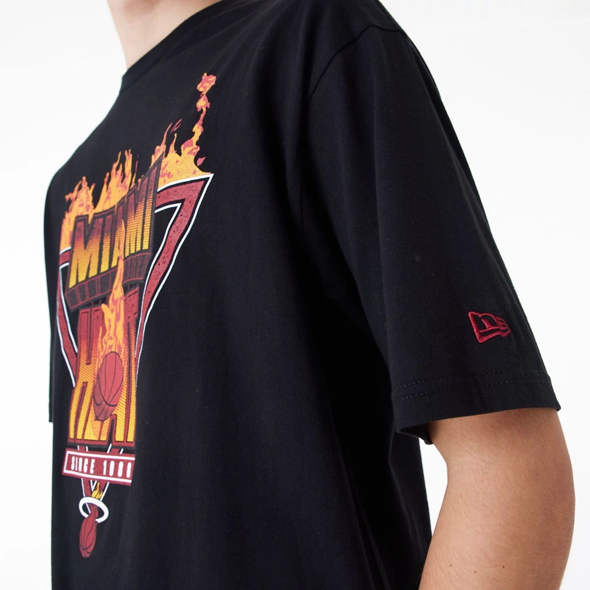 The Male model is wearing Miami Heat NBA Flame Graphic Black Oversized T-Shirt 3