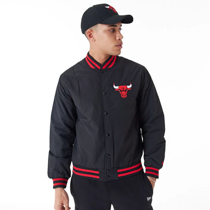 The Male model is wearing Chicago Bulls NBA Script Logo Black Bomber Jacket 1